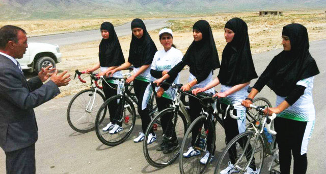 Afghan women line up before the ride. The women are riding to promote womens rights across their country and the rest of the world. 