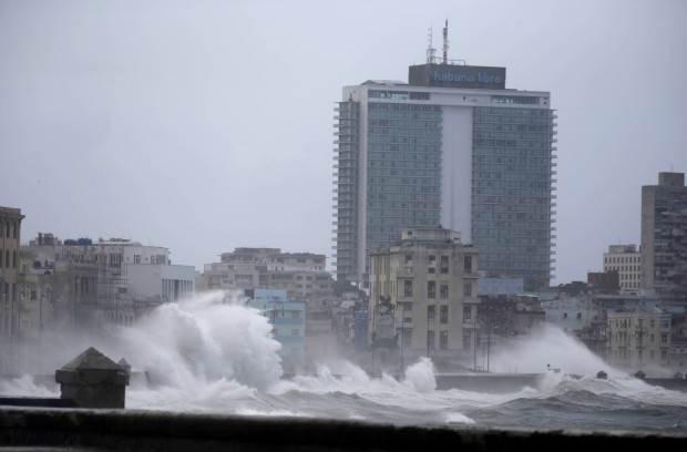 Waves surge over a sea wall in Havana, Cuba, Saturday, Sept. 9, 2017. There were no reports of deaths or injuries after heavy rain and winds from Hurricane Irma lashed northeastern Cuba. (AP Photo/Ramon Espinosa)